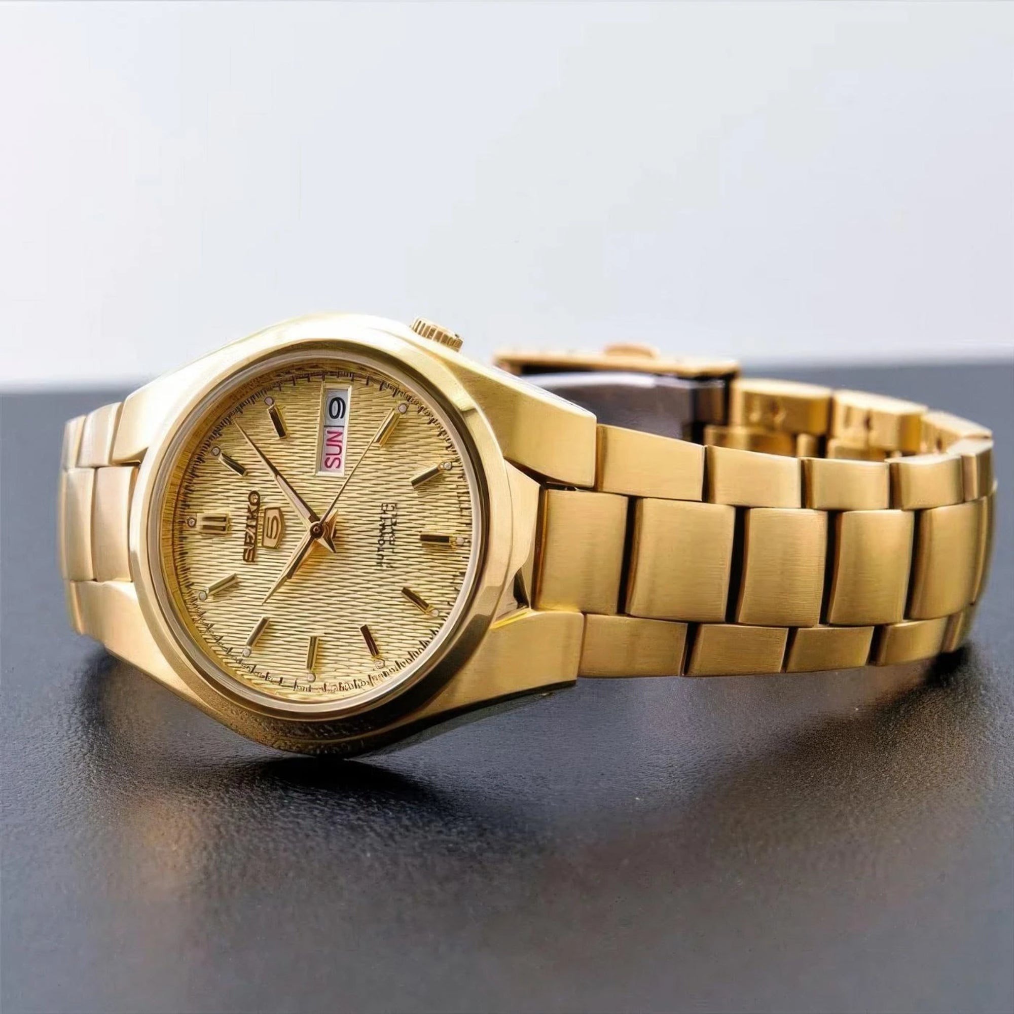 Seiko 5 Automatic Self Wind Gold Dial Gold PVD Steel Bracelet Men's Watch SNK610K1