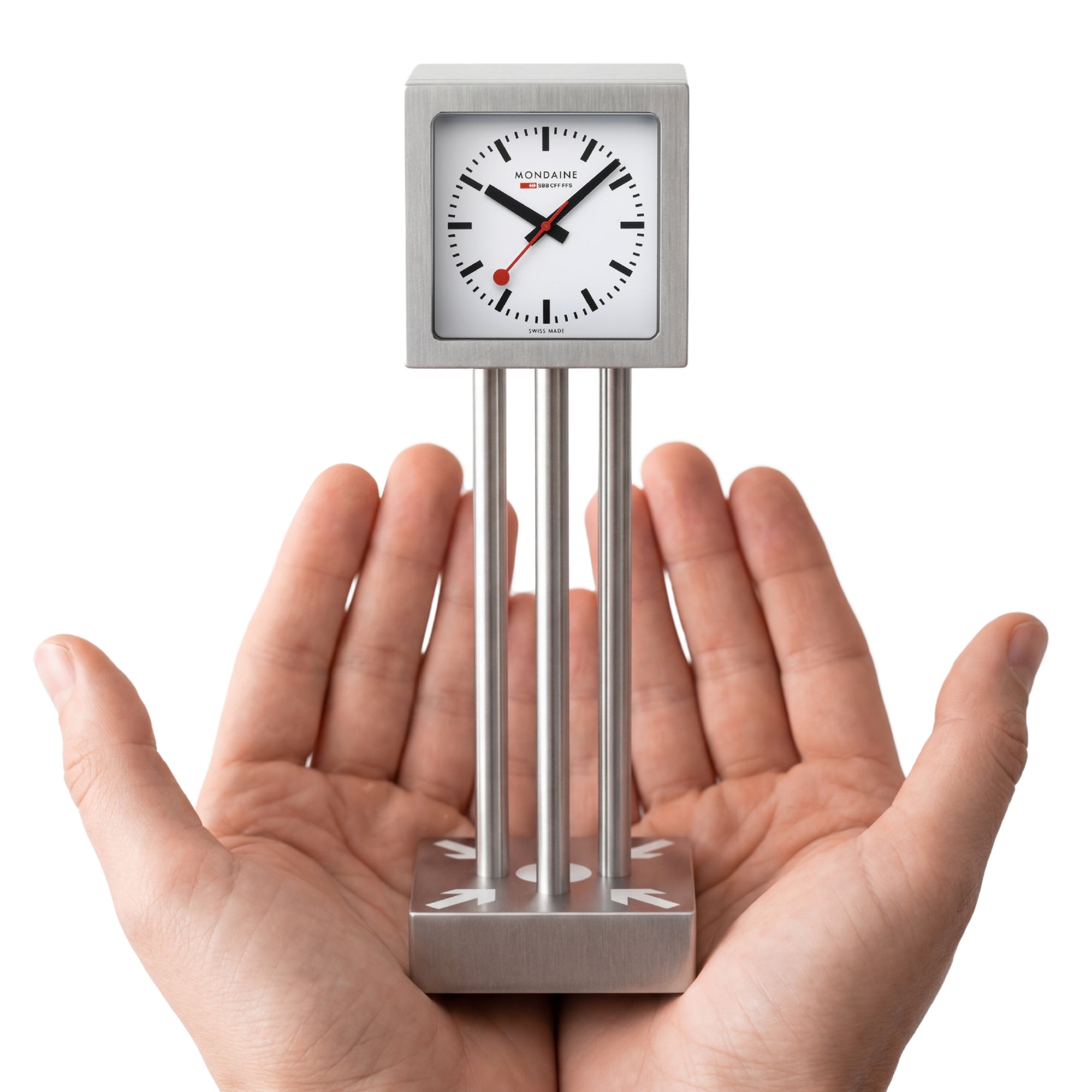 Miniature table clock with brushed aluminum base and white face