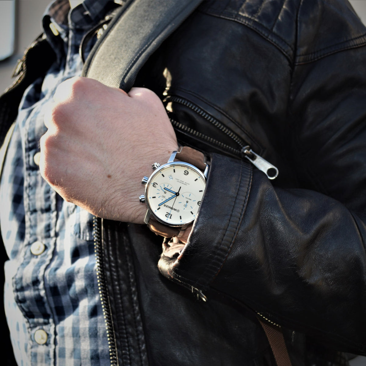Wenger Metropolitan Chronograph 01.1743.111 lifestyle wrist view featuring cream dial face and brown leather strap