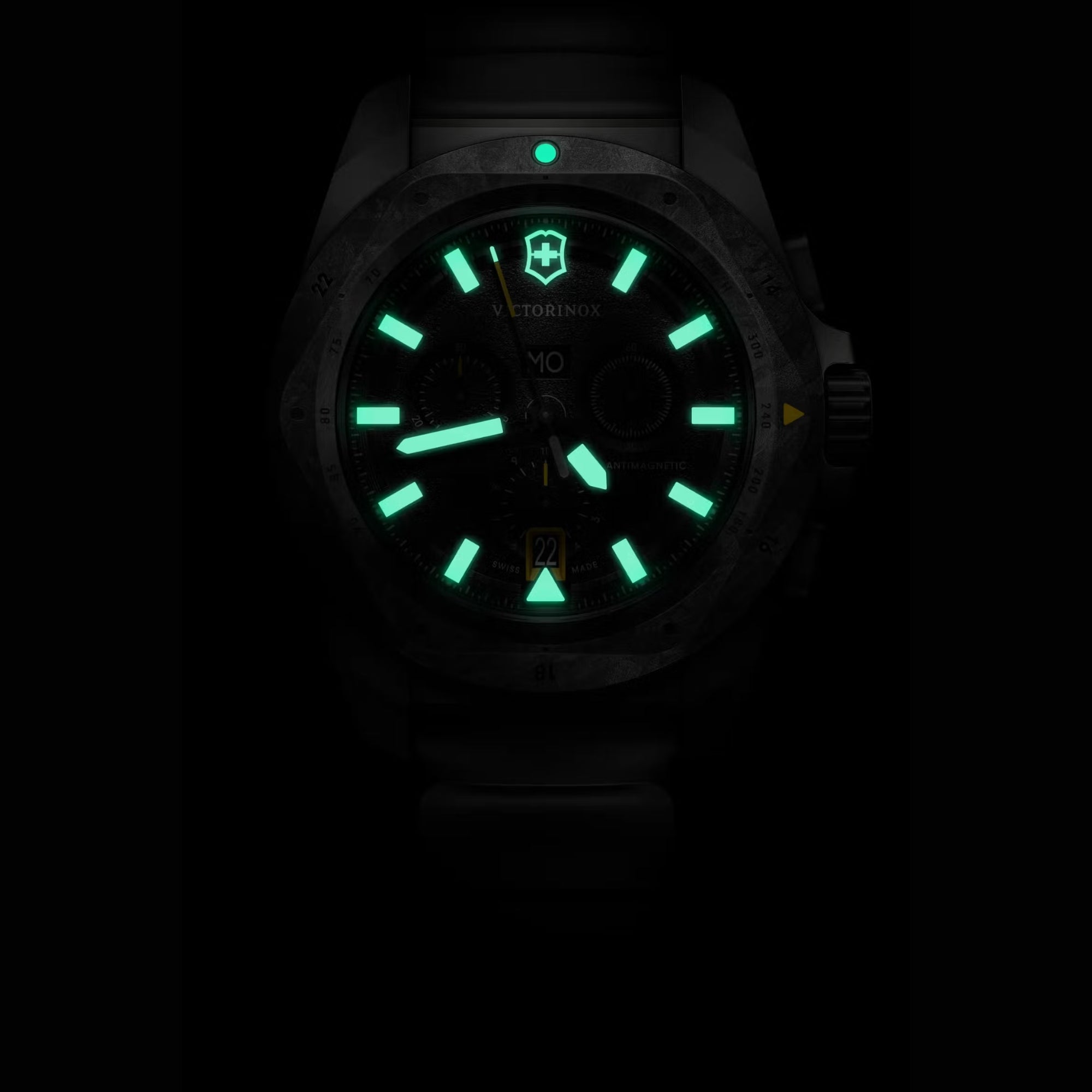 Victorinox I.N.O.X. 242011 titanium case in dark showing its luminous hands and markers