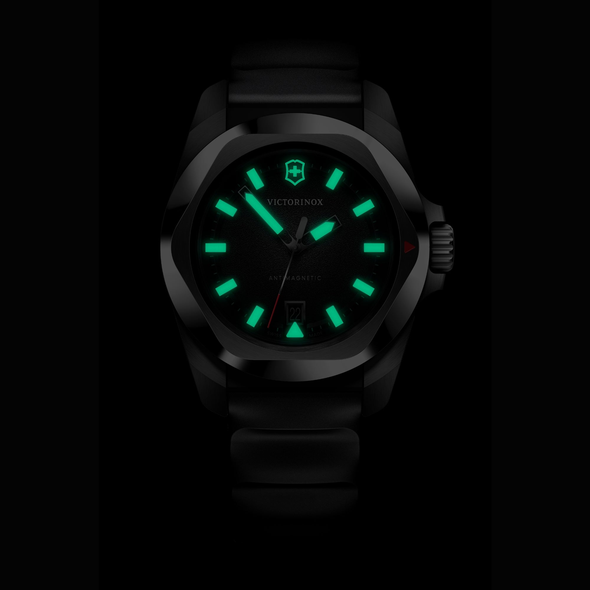Victorinox I.N.O.X. rubber quartz 242028 watch with glowing green luminous hands and markers in dark setting