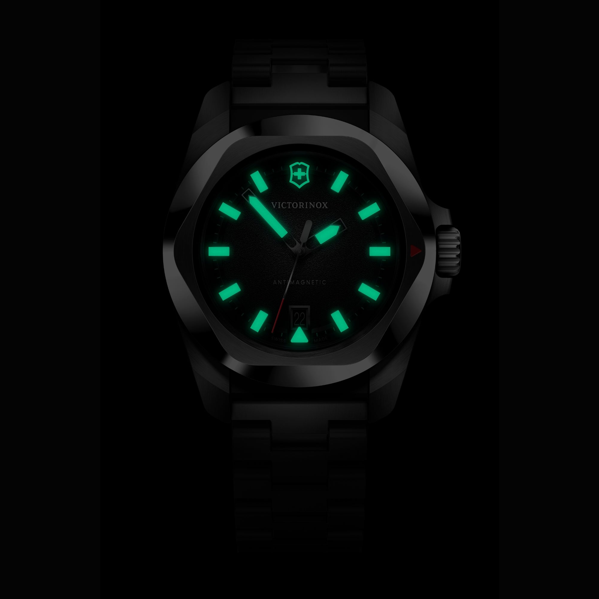 Front view of a Victorinox I.N.O.X. 41mm 242030 watch highlighting bright green luminous hands