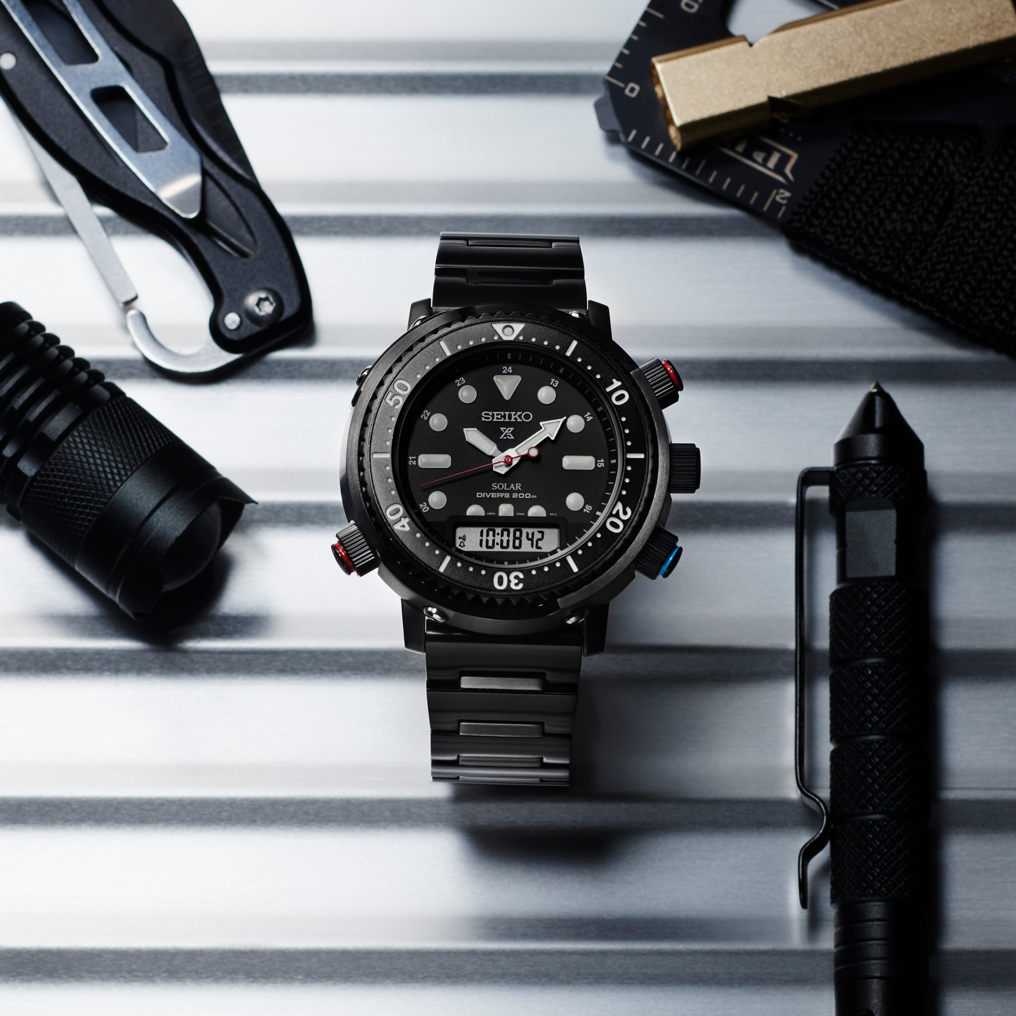 Seiko Prospex Solar Arnie Hybrid Divers 40th Anniversary Automatic Black Dial Black Steel Bracelet SNJ037P1