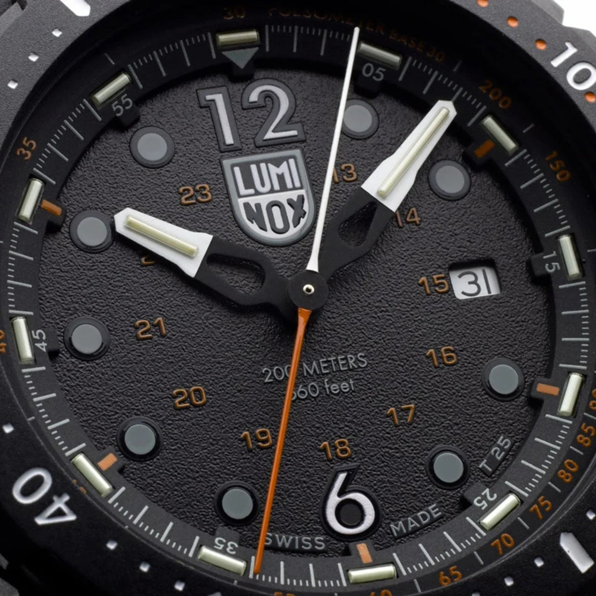Luminox ICE SAR Arctic 1050 Series XL.1052 extreme close up of black textured dial, hands, and orange second hand