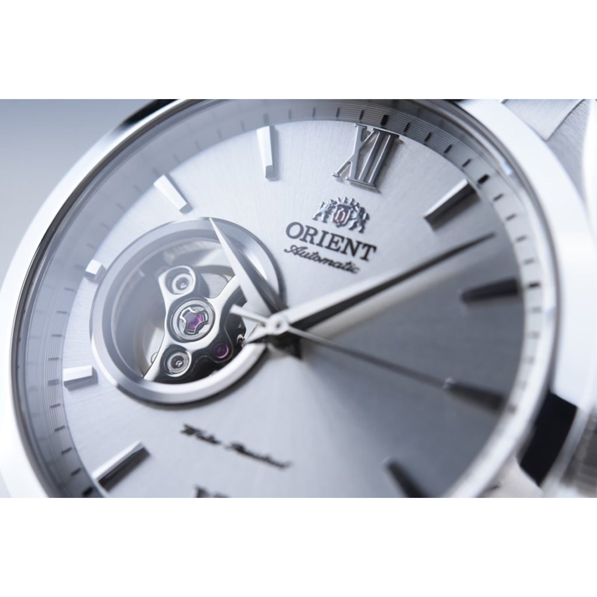 Orient Golden Eye II Contemporary Open Heart White Dial Steel Strap Men's Watch TAG03001W0