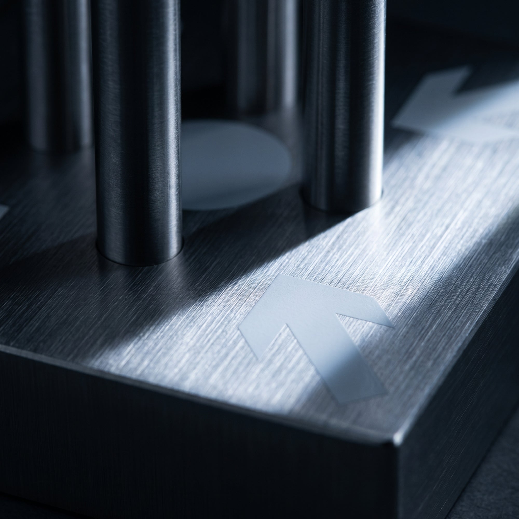 Brushed aluminum table clock base with vertical supports
