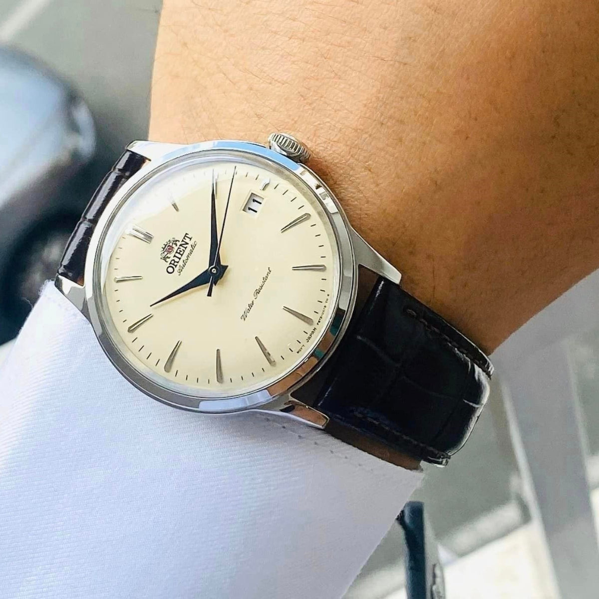 Orient Bambino Mechanical Champagne Dial Leather Strap Men’s Watch RA-AC0M04Y30B