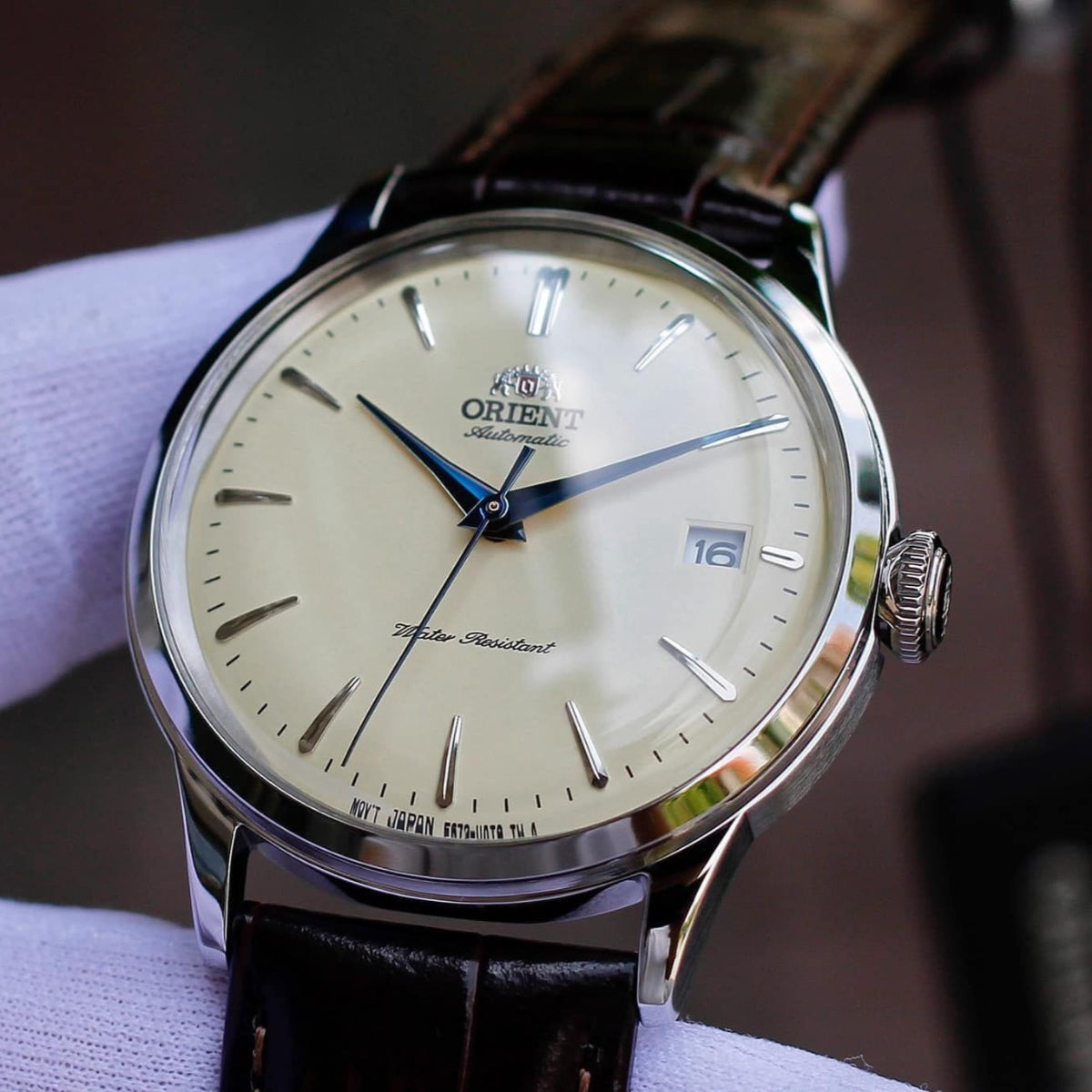 Orient Bambino Mechanical Champagne Dial Leather Strap Men’s Watch RA-AC0M04Y30B