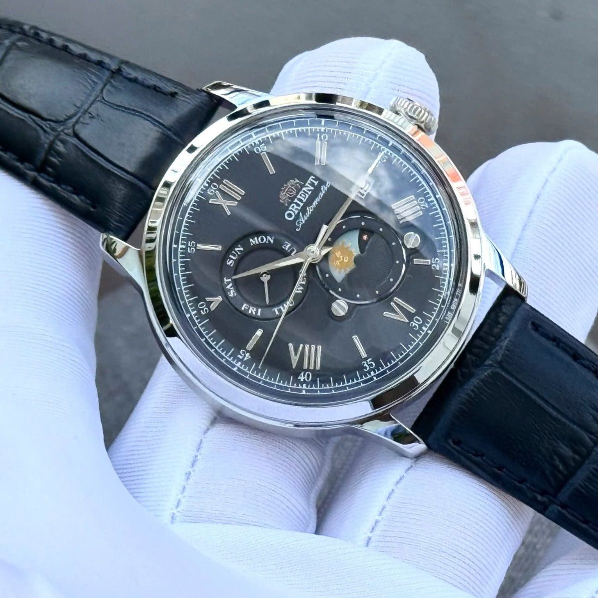 Orient Bambino Sun & Moon Blue Dial Leather Strap Men's Dress Watch RA-AK0806L30B