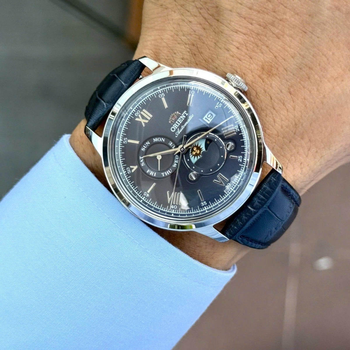 Orient Bambino Sun & Moon Blue Dial Leather Strap Men's Dress Watch RA-AK0806L30B