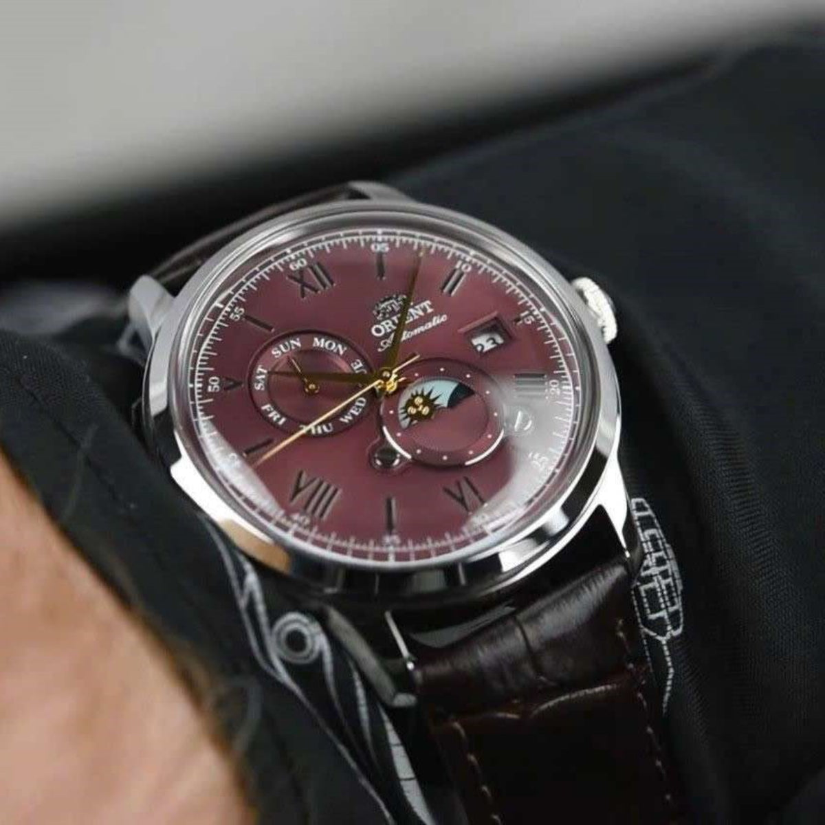 Orient Bambino Sun & Moon Red Dial Leather Strap Men's Dress Watch RA-AK0807R30B