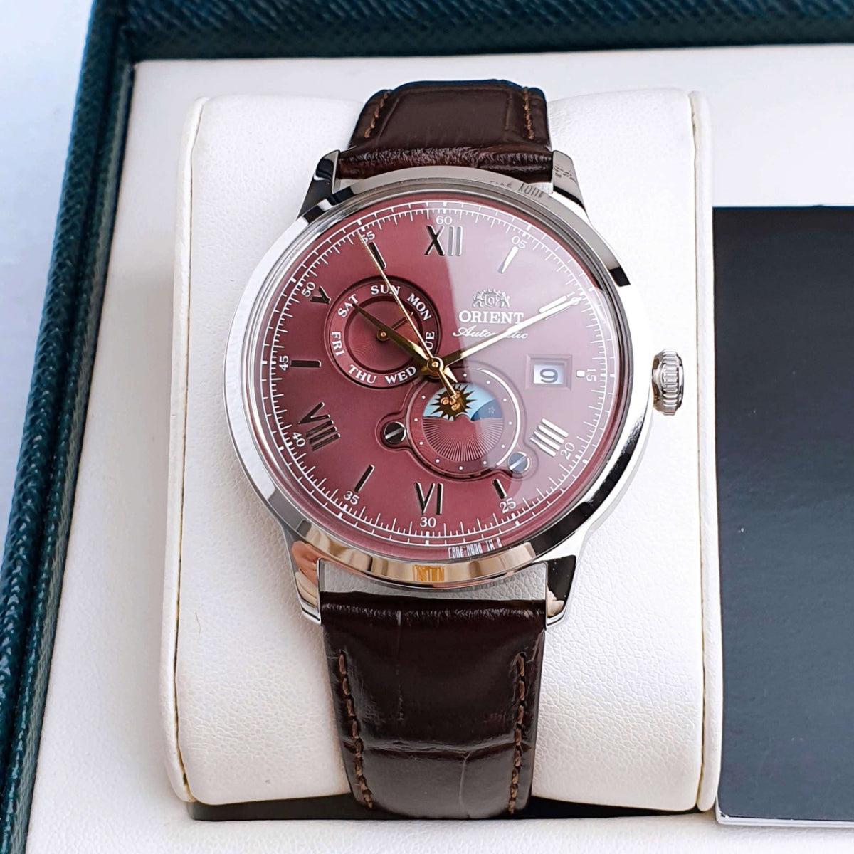 Orient Bambino Sun & Moon Red Dial Leather Strap Men's Dress Watch RA-AK0807R30B