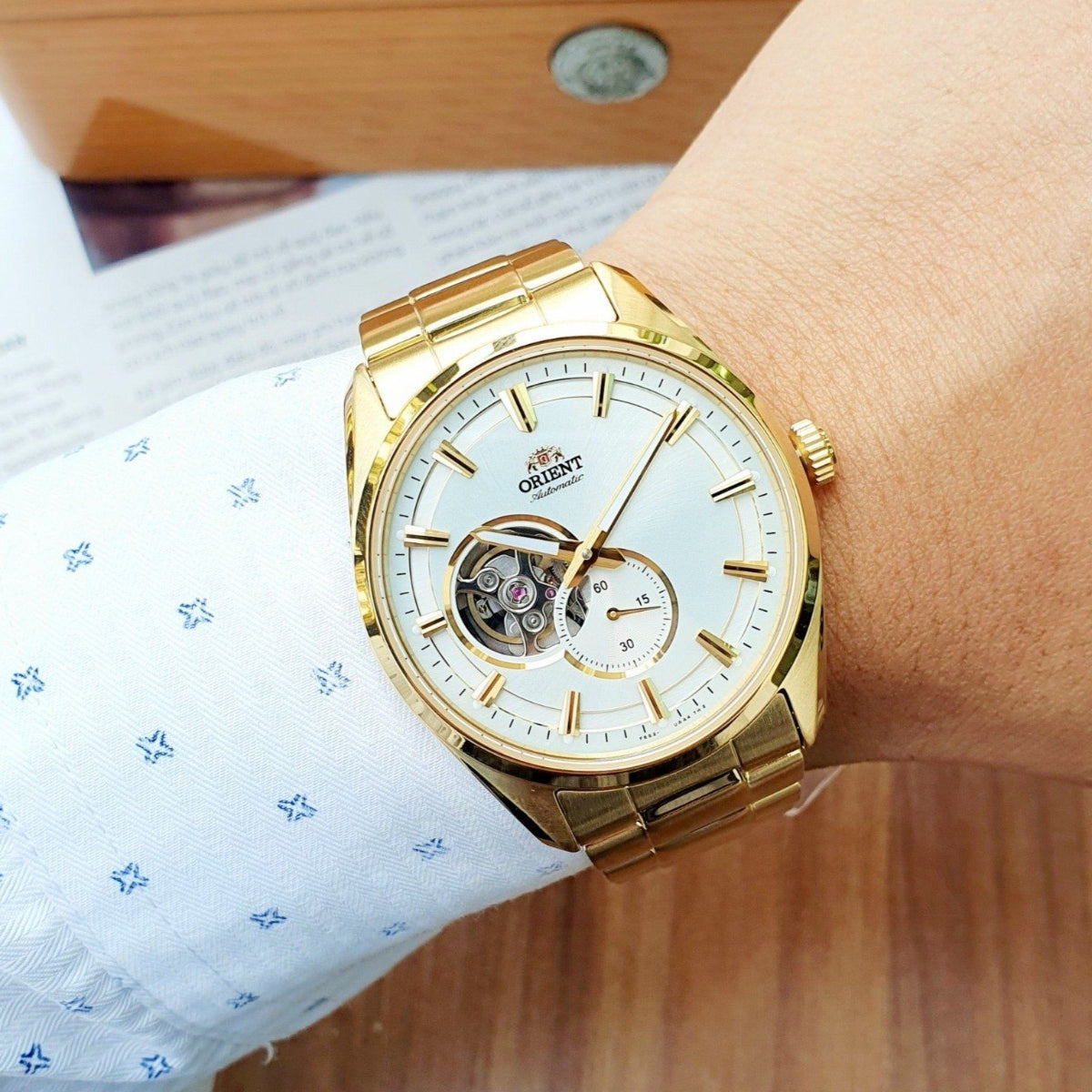 Orient RA-AR0007S30B golden bracelet automatic watch worn on wrist