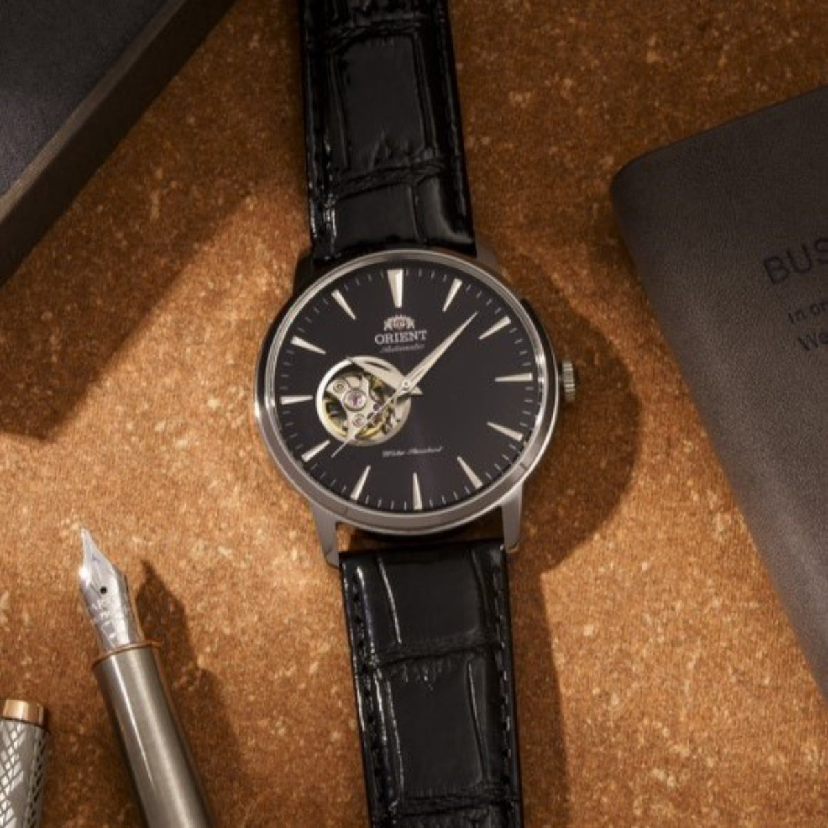 Orient Contemporary Open Heart Automatic Black Dial Leather Strap Men’s Watch TAG02004B0