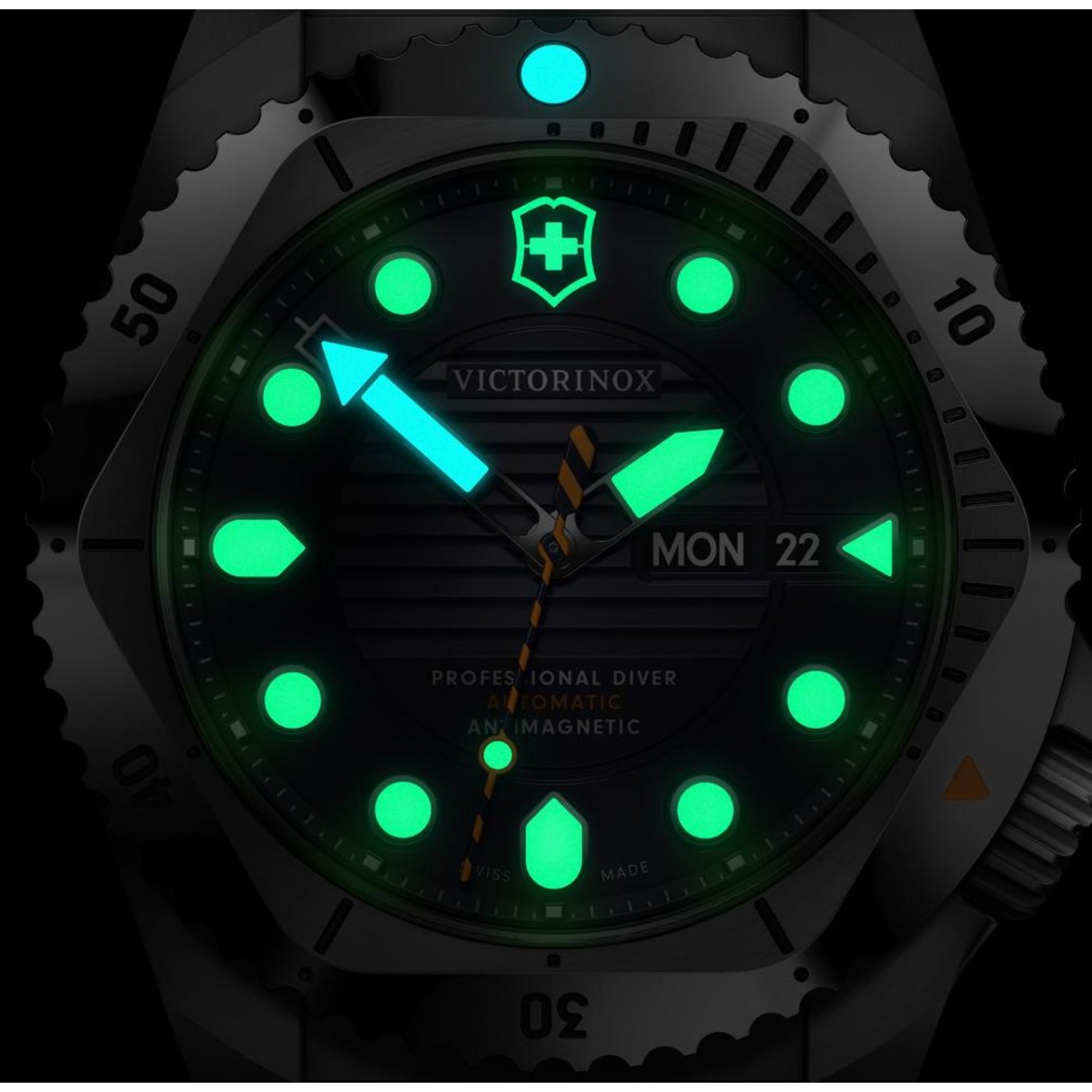 Victorinox Dive Pro 241995 unidirectional bezel and luminous markers at dark close up