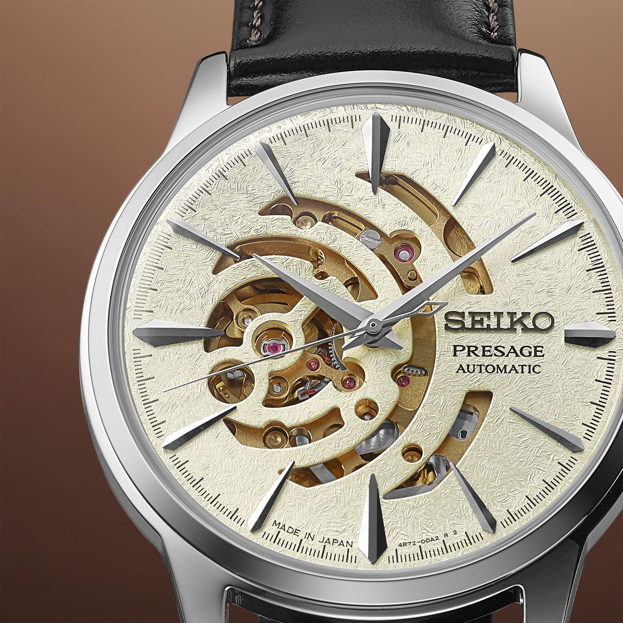 Seiko Presage watch with visible mechanical components on a brown background