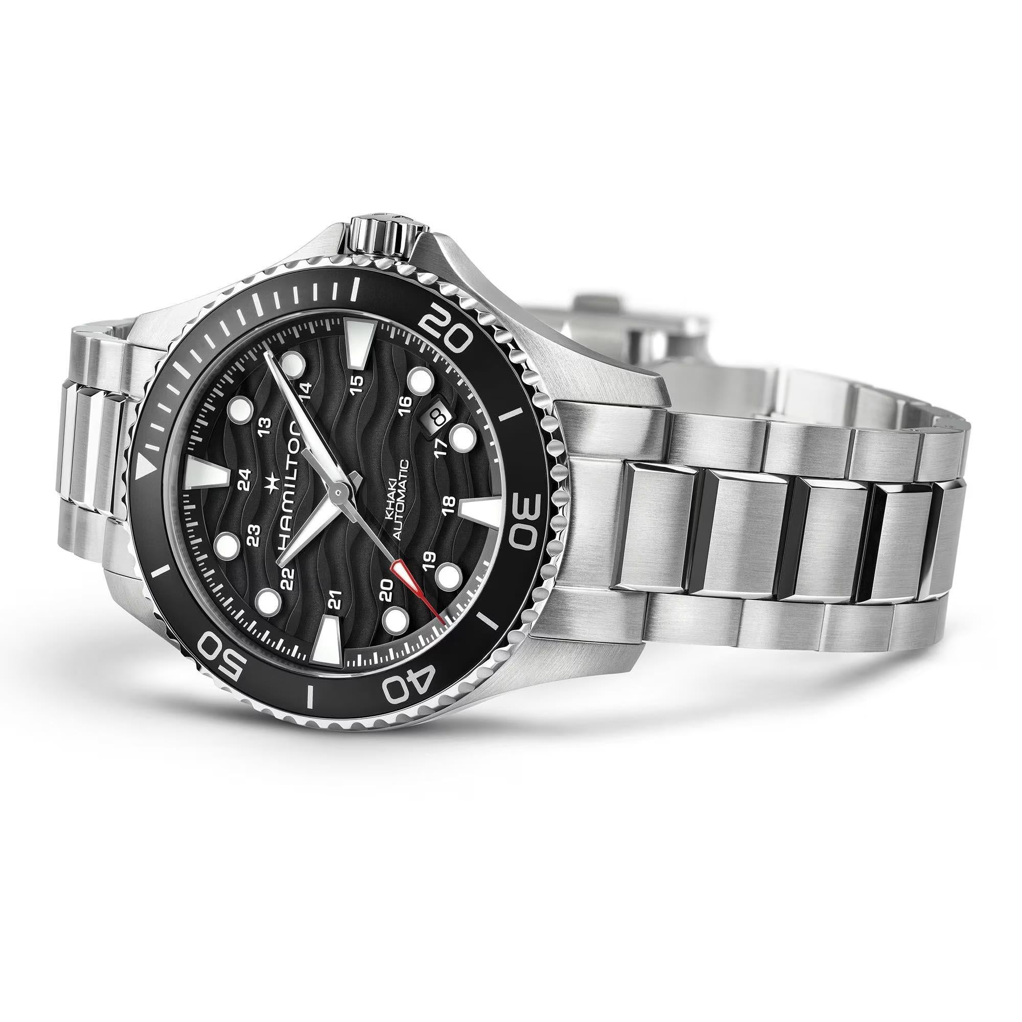 Stainless steel automatic dive watch, black dial and rotating bezel, metal bracelet