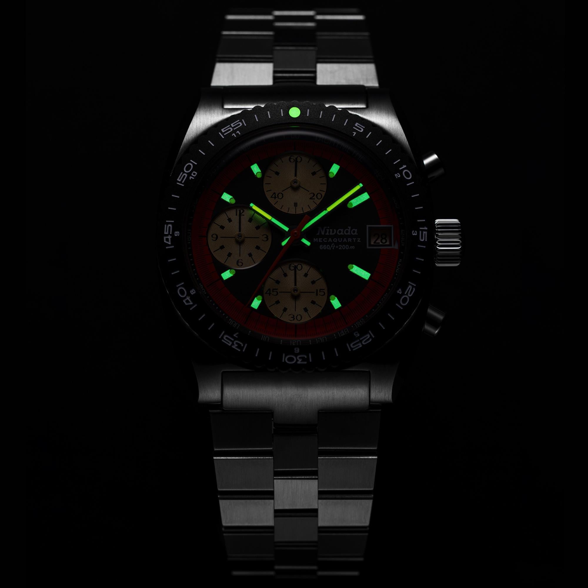 Men's chronograph watch with green luminous hands and markers on dark dial