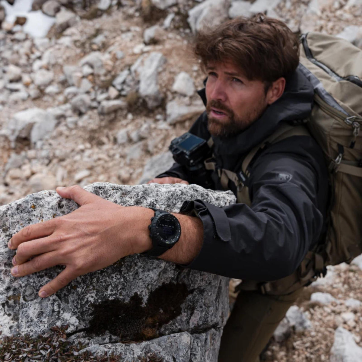 Suunto Core SS051780000 on-wrist view worn during outdoor mountain climbing activity