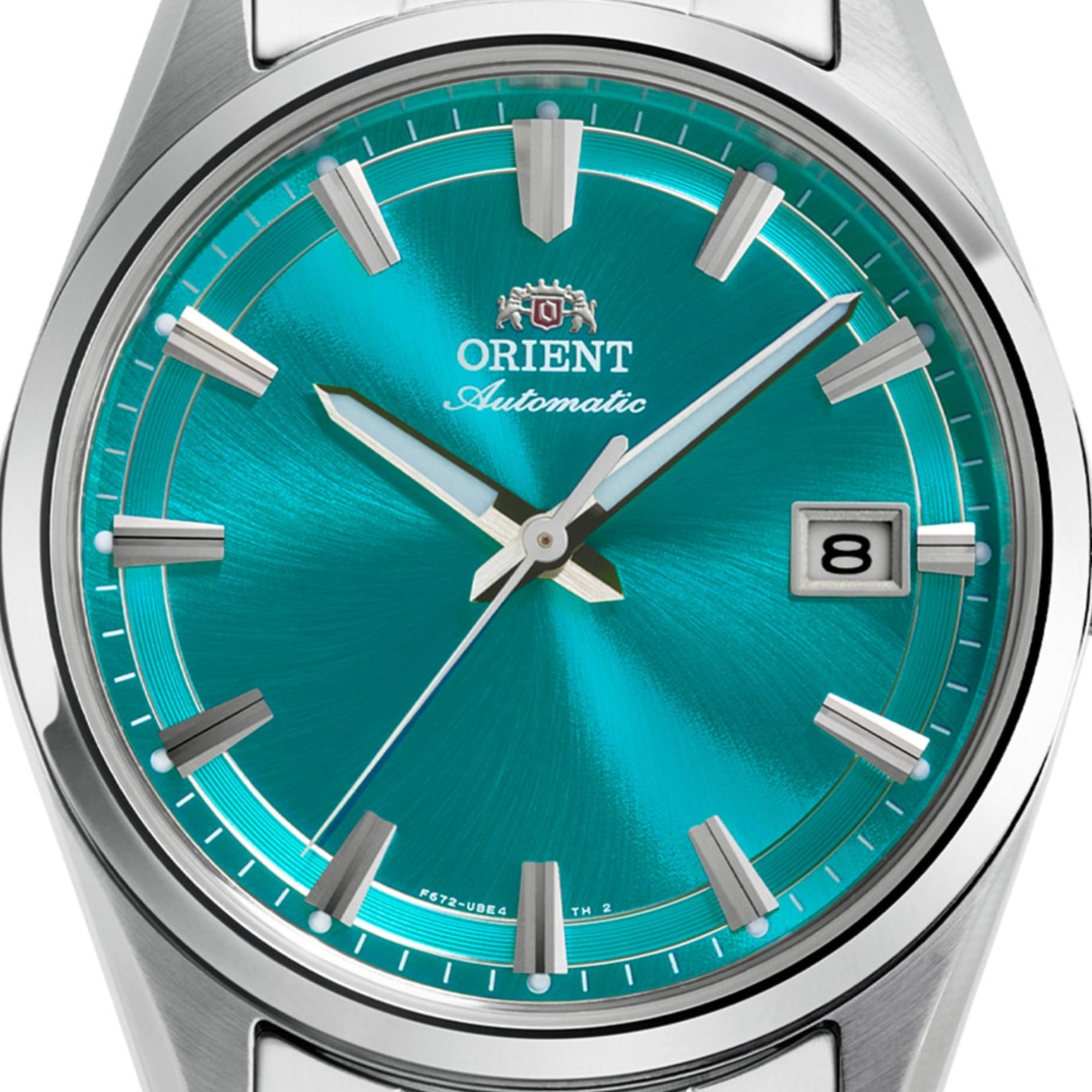 Front view of an Orient Stretto automatic watch dial in turquoise with a date window