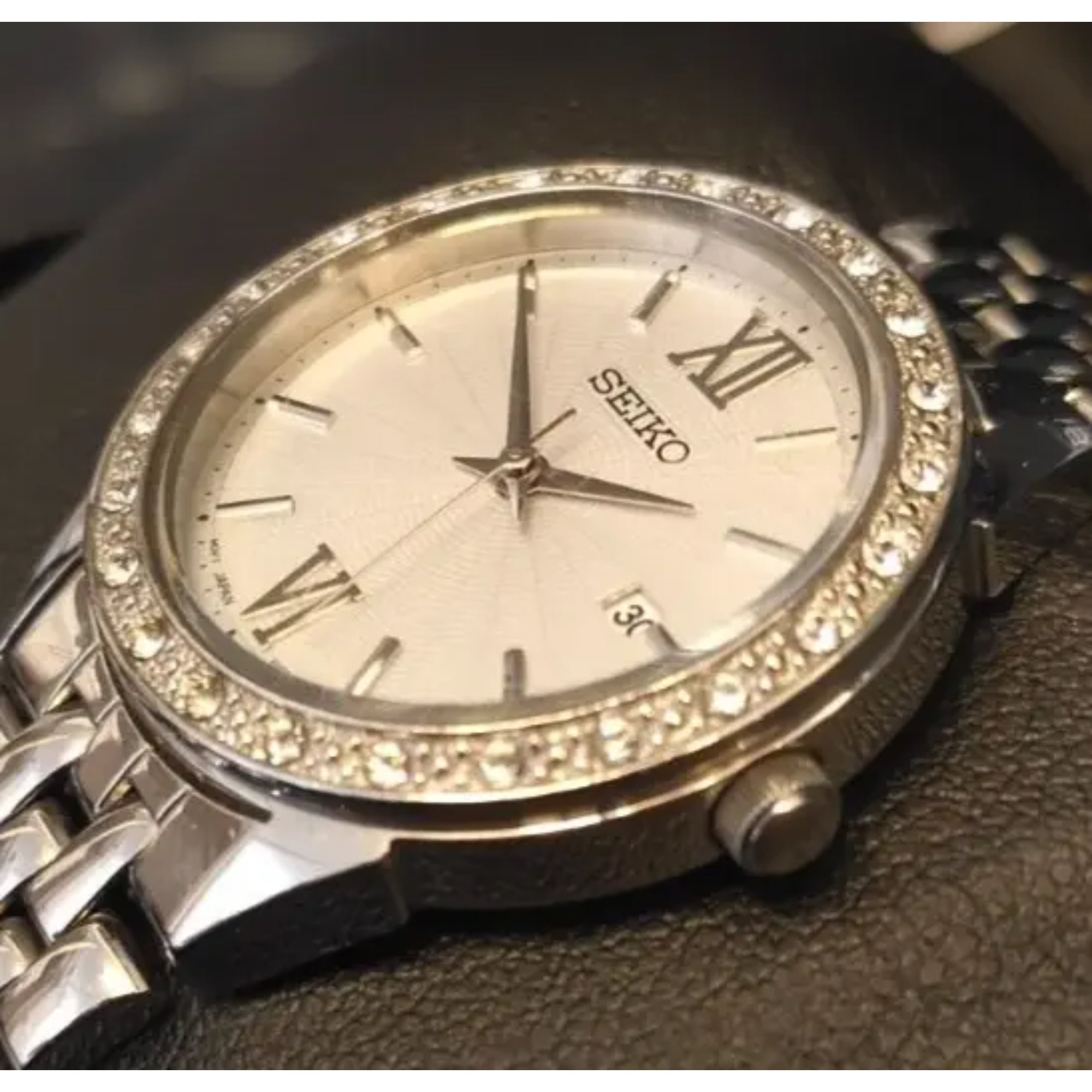 Seiko Ladies Dress Watch Silver Dial Steel Bracelet Jewelled Bezel SUR695P1