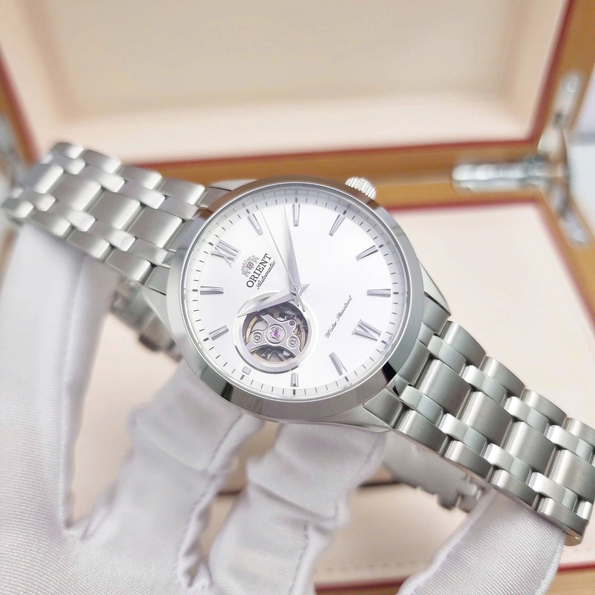 Orient Golden Eye II Contemporary Open Heart White Dial Steel Strap Men's Watch TAG03001W0