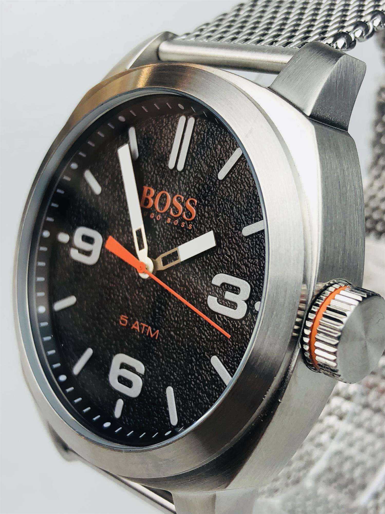 The Watch: Hugo Boss Orange Cape Town Stainless Steel Mesh Strap Stainless Steel Case Men’s Watch 1550013In a homage to the mountainous city from which it takes its name, this Hugo Boss Orange Cape Town Stainless Steel Men’s Watch (1550013) features a confident stainless steel mesh bracelet and case, with a sleek and contemporary dial design ensuring this sense of adventure is underpinned by the Hugo Boss design ethos.&nbsp;Key Features:Quartz MovementBlack DialStainless Steel Mesh BraceletWater Resistant t