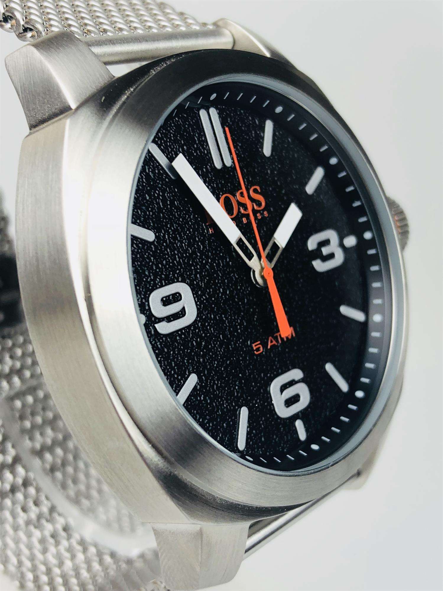 The Watch: Hugo Boss Orange Cape Town Stainless Steel Mesh Strap Stainless Steel Case Men’s Watch 1550013In a homage to the mountainous city from which it takes its name, this Hugo Boss Orange Cape Town Stainless Steel Men’s Watch (1550013) features a confident stainless steel mesh bracelet and case, with a sleek and contemporary dial design ensuring this sense of adventure is underpinned by the Hugo Boss design ethos.&nbsp;Key Features:Quartz MovementBlack DialStainless Steel Mesh BraceletWater Resistant t
