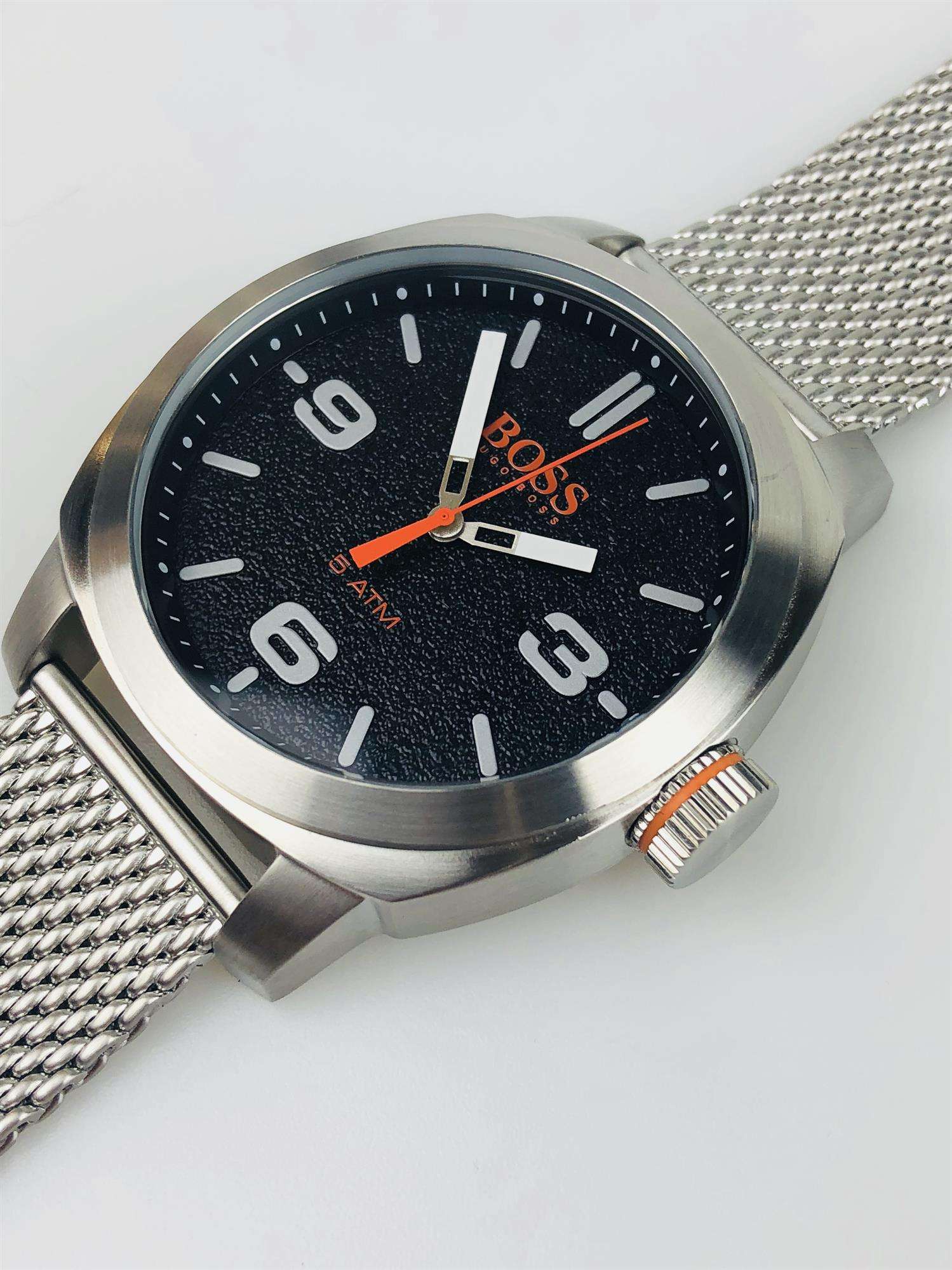 The Watch: Hugo Boss Orange Cape Town Stainless Steel Mesh Strap Stainless Steel Case Men’s Watch 1550013In a homage to the mountainous city from which it takes its name, this Hugo Boss Orange Cape Town Stainless Steel Men’s Watch (1550013) features a confident stainless steel mesh bracelet and case, with a sleek and contemporary dial design ensuring this sense of adventure is underpinned by the Hugo Boss design ethos.&nbsp;Key Features:Quartz MovementBlack DialStainless Steel Mesh BraceletWater Resistant t