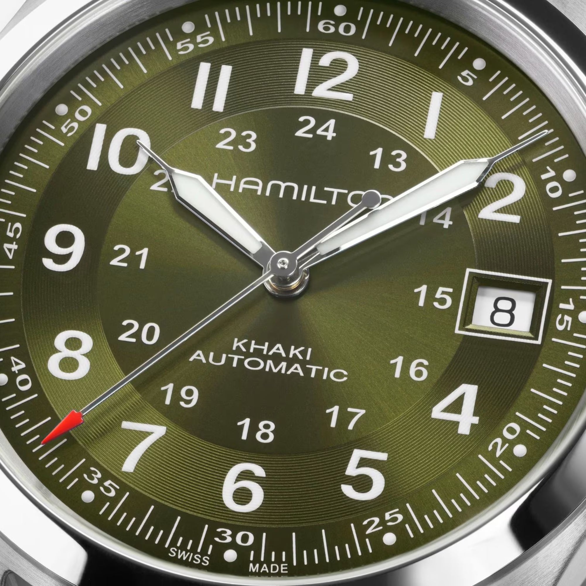 Hamilton Khaki Field H70455560 green sunray dial with snailing effect and Arabic numerals close-up