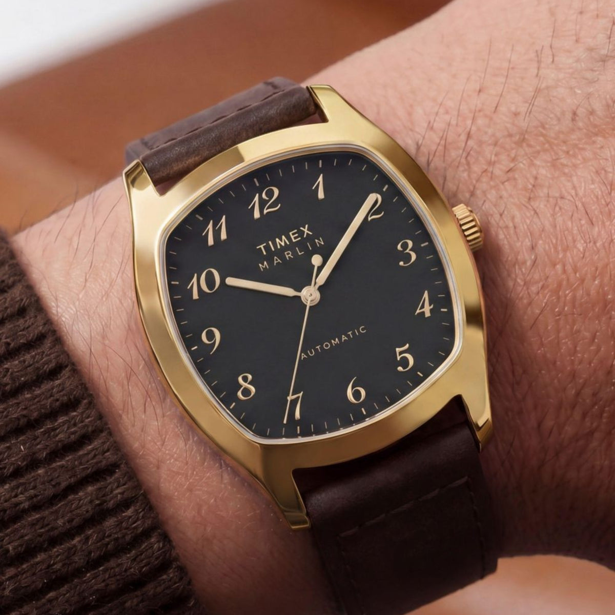 Timex Marlin Chatham TW2Y84500 wrist view showing a black dial automatic watch styled on a person wearing a leather strap