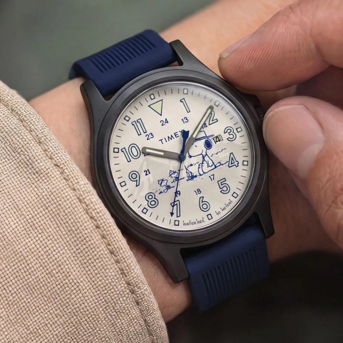 Timex Peanuts x Expedition Acadia TW2Y84700 wrist view showing cream dial quartz watch styled on a person wearing a silicone strap