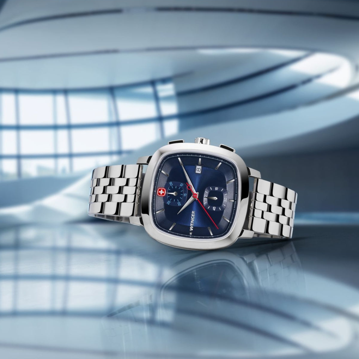 Wenger Vintage Classic 01.1933.103 angled perspective view showing blue cushion dial face and stainless steel bracelet