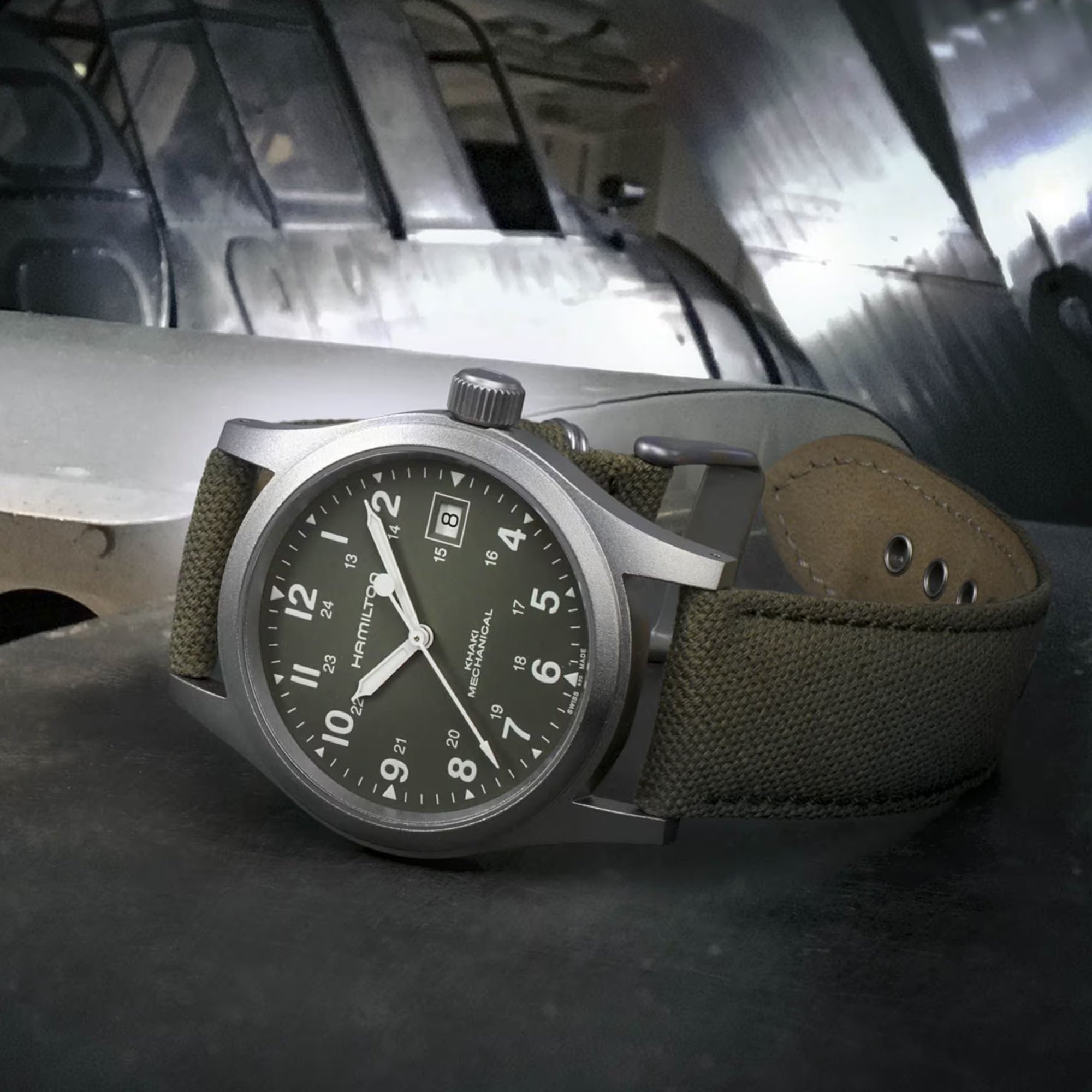 Hamilton Khaki Field 38mm Mechanical watch with a green dial and green canvas strap.