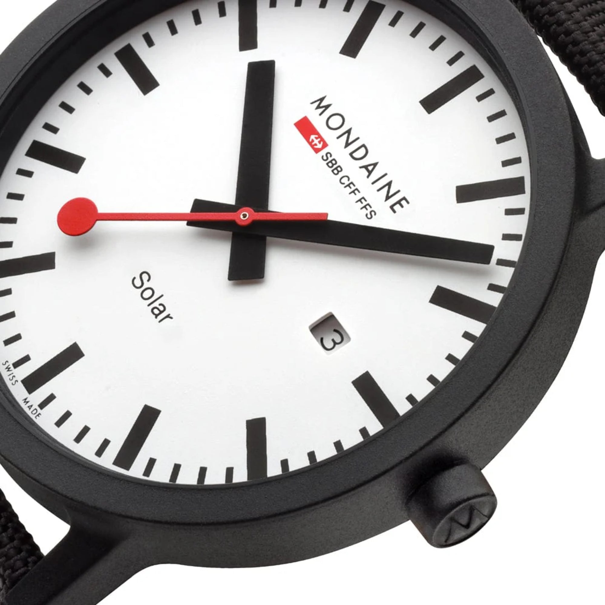 Close-up of Mondaine Essence MS1.41910.LB dial showing solar text, date aperture, and red second hand