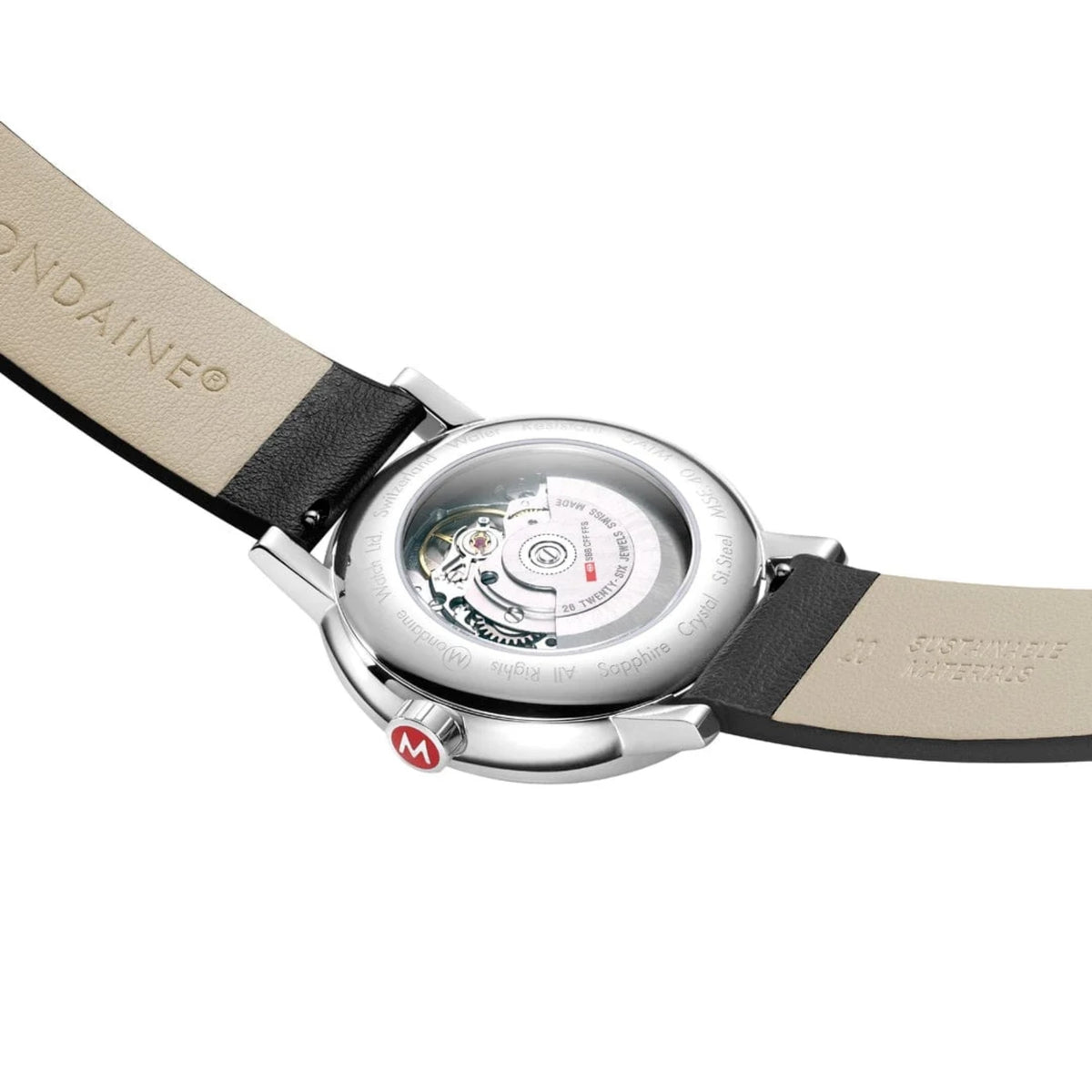 Mondaine watch case back with visible mechanical movement and black leather strap