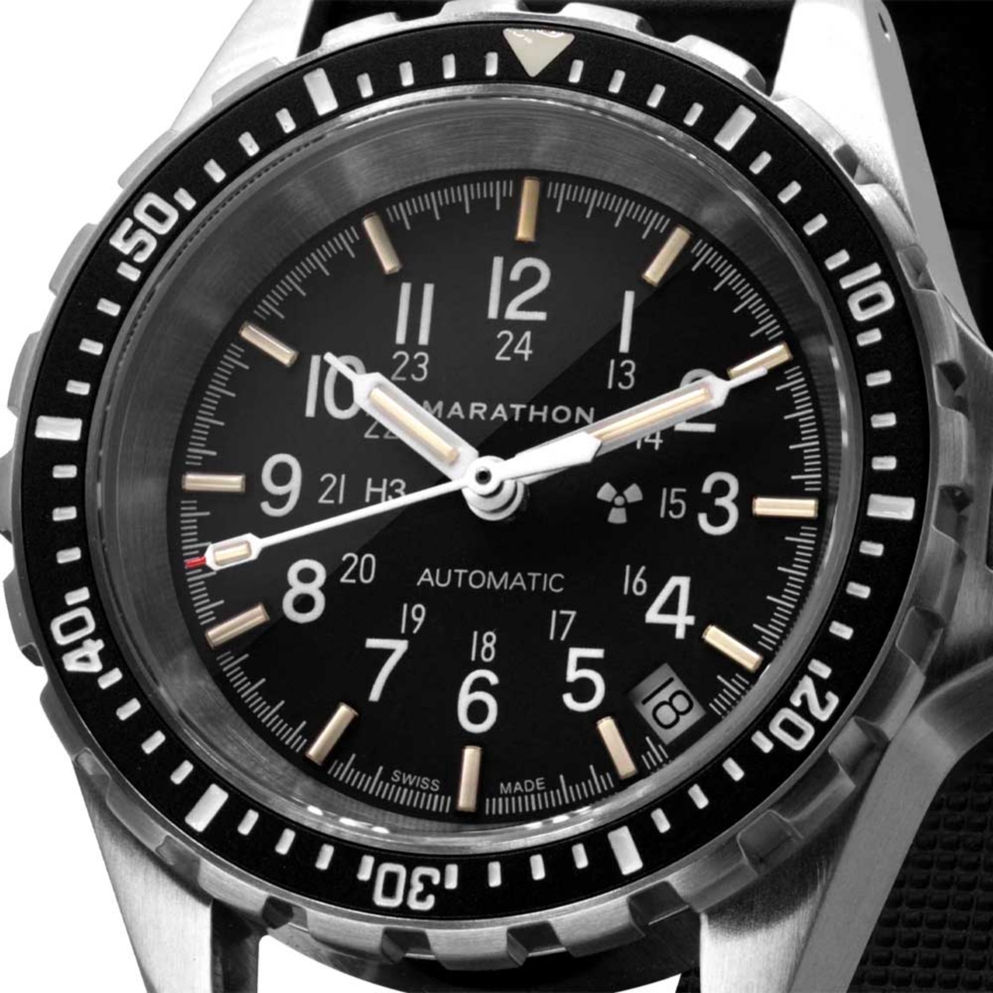 Marathon automatic diver’s watch close-up of black dial, white markers, and stainless bezel