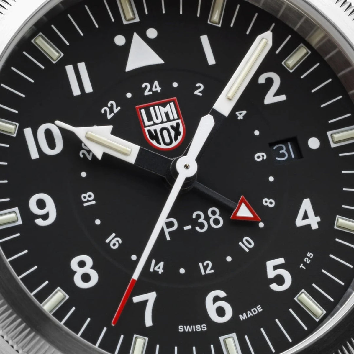 Luminox P-38 Lightning Air Pilot 9520 Series XA.9521 black dial watch macro close-up of inner GMT ring, hands, and date window