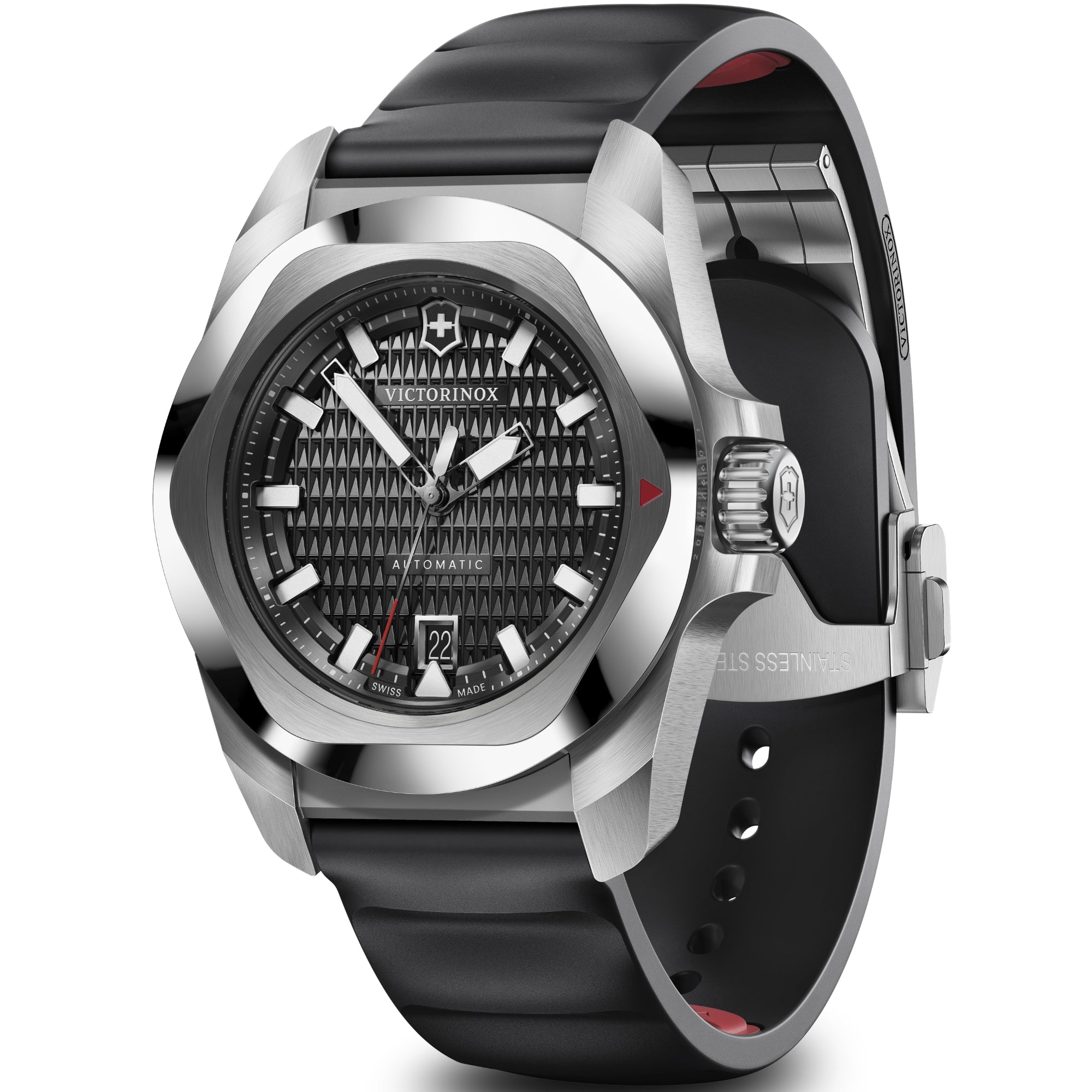 A stainless steel Victorinox I.N.O.X. watch, featuring a textured black dial and a black rubber strap