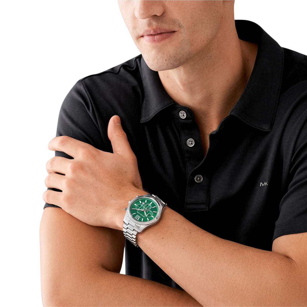 Michael Kors Lexington MK9152 worn on wrist displaying green dial with steel bracelet profile
