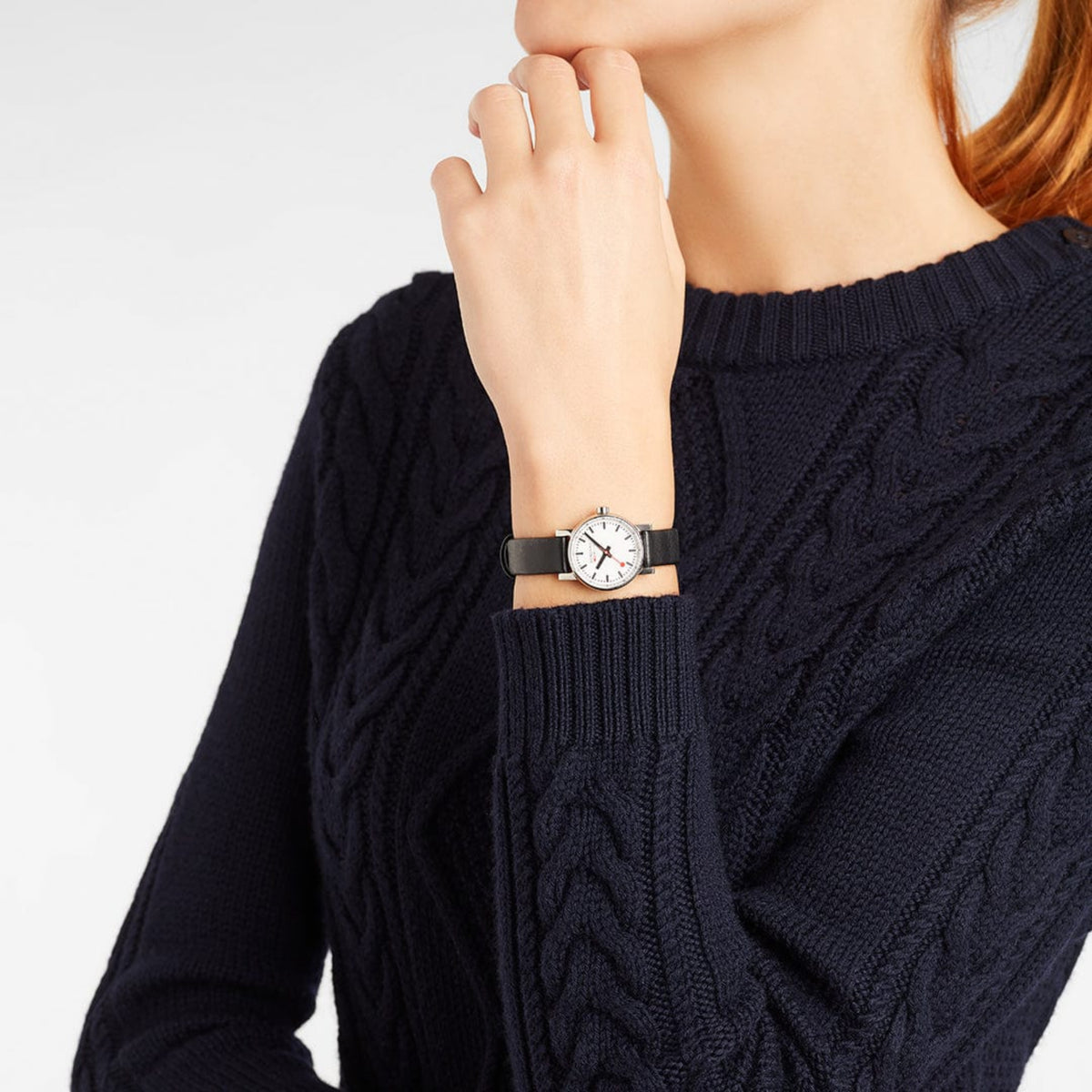 Mondaine Evo2 MSE.26110.LBV 26mm ladies quartz watch with white dial and black leather strap on wrist