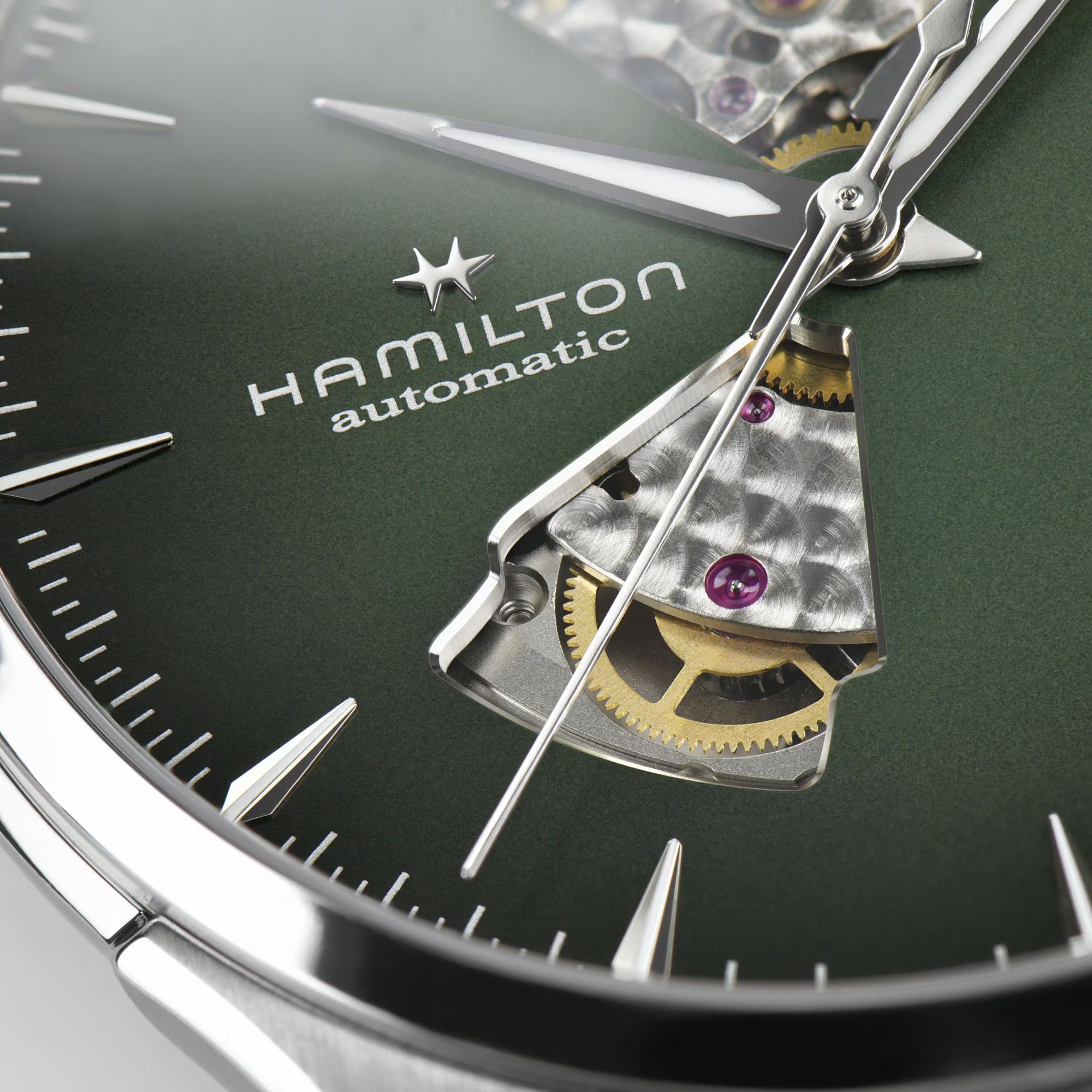 Hamilton H32675560 smoked green dial with open-heart aperture and silver dagger markers close-up