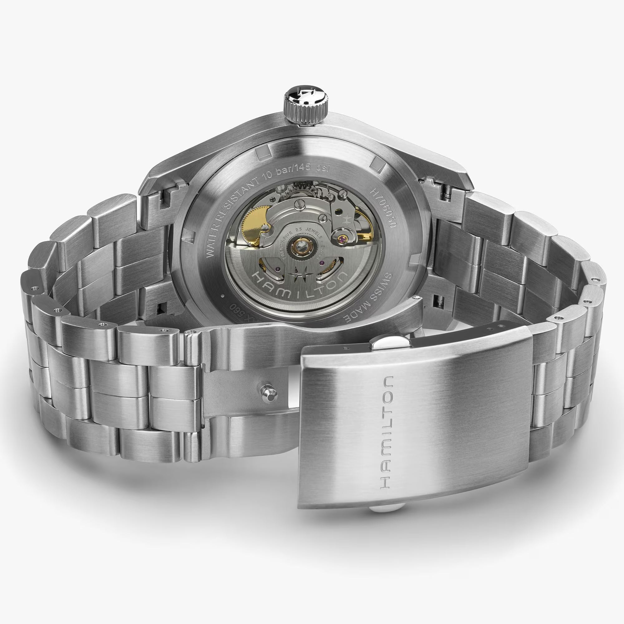 Hamilton Khaki Field H70605140 stainless steel bracelet and folding clasp with its see-through case back revealing H-10 movement