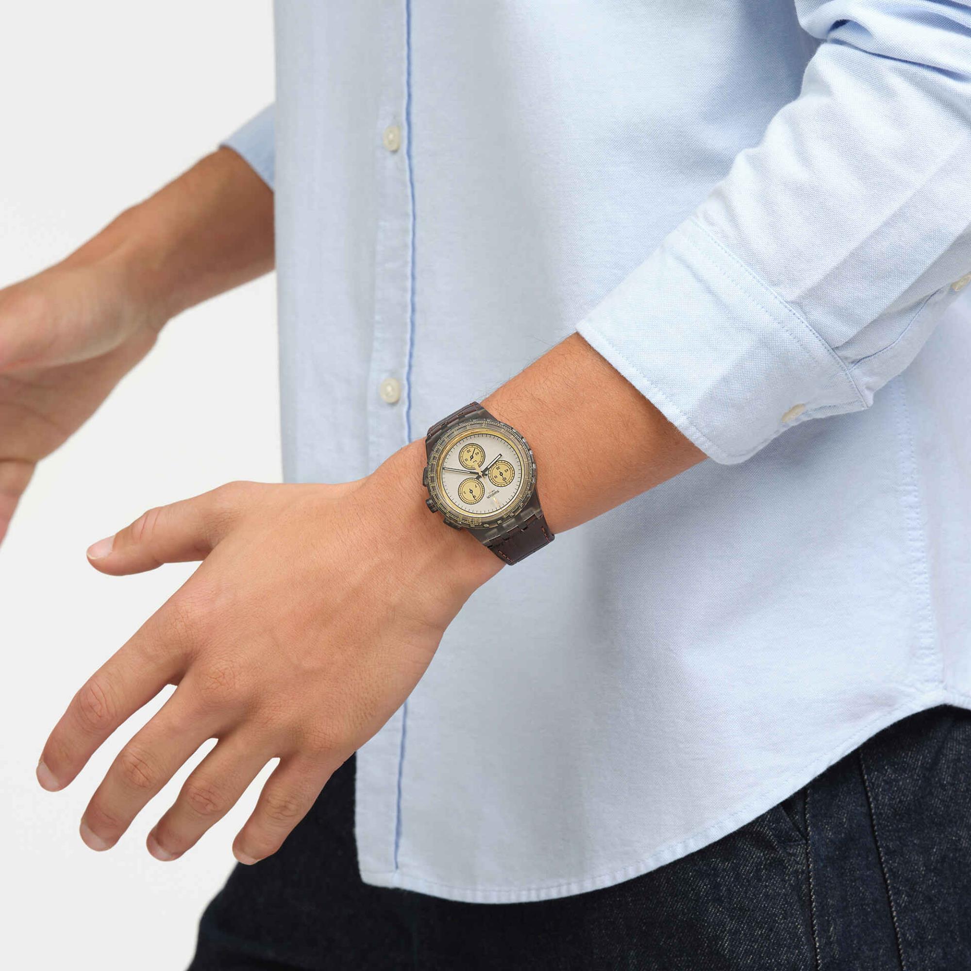 Swatch Holiday Collection Golden Radiance NEON Quartz Grey Dial Brown Leather Strap Men's Watch SUSM100