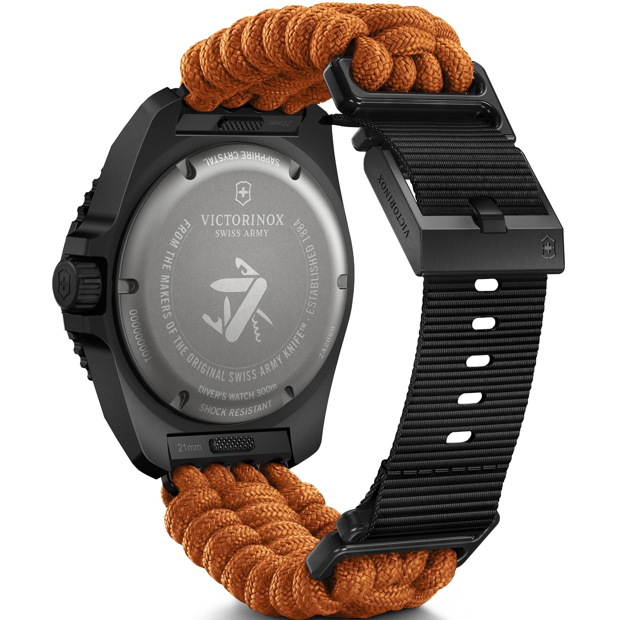 The caseback view of a black  Victorinox Dive Pro watch, featuring a solid engraved backing and an orange paracord strap