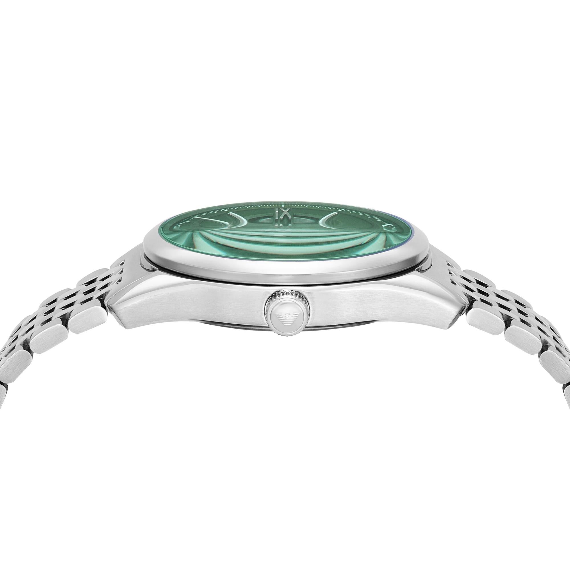 Steel watch case with green dial visible through crystal, side profile view.