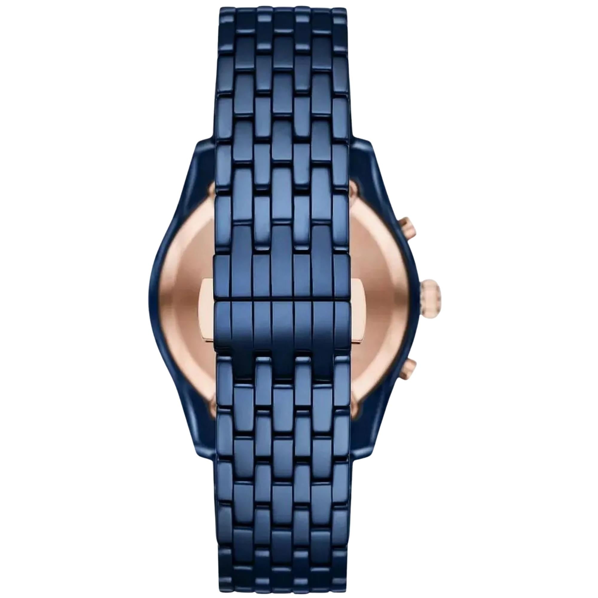 Blue ceramic chronograph watch showing blue bracelet links and round case profile