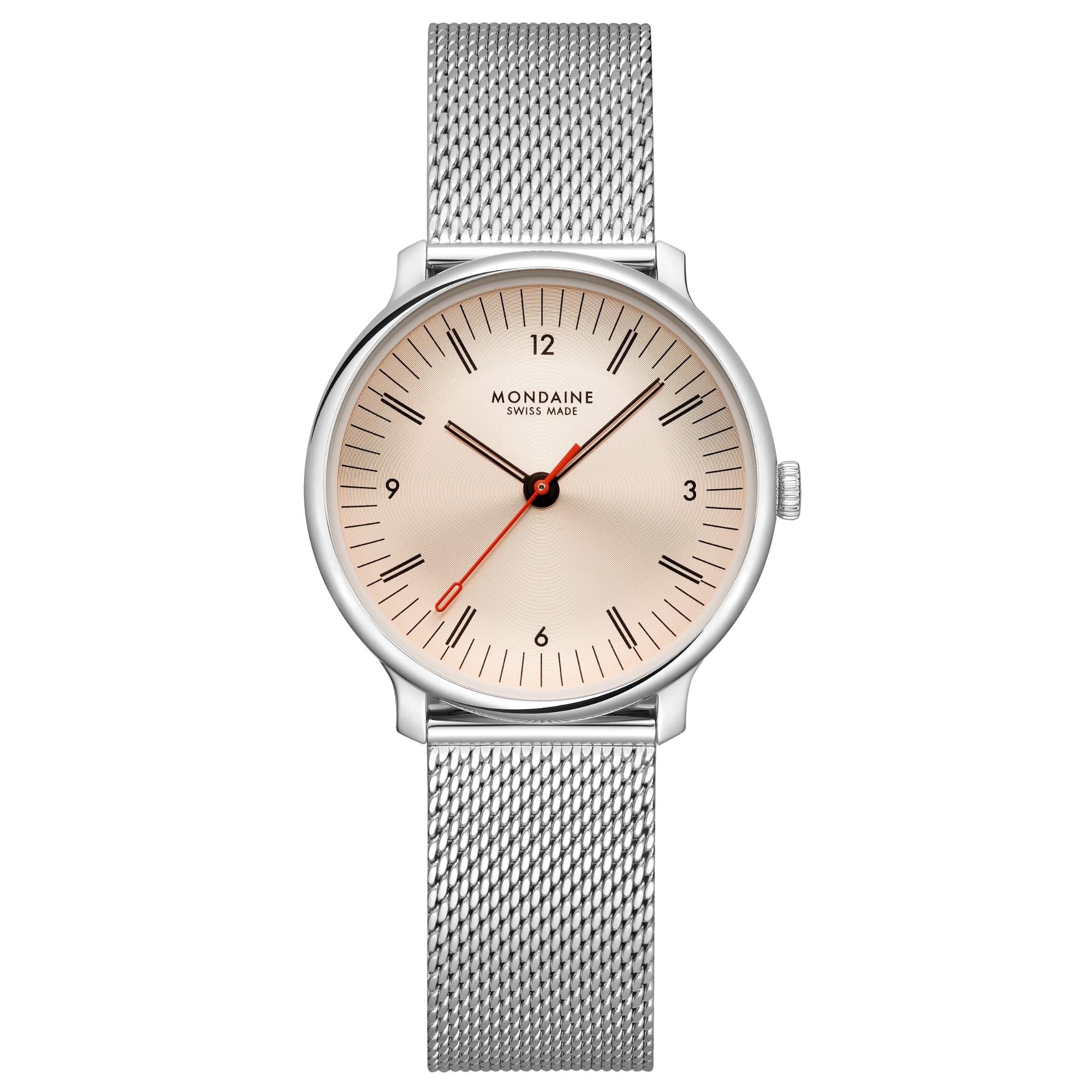 Front studio shot of Mondaine Doppio watch, showcasing its stainless steel mesh bracelet, polished round bezel, and rose gold dial with black line markers and the signature red second hand