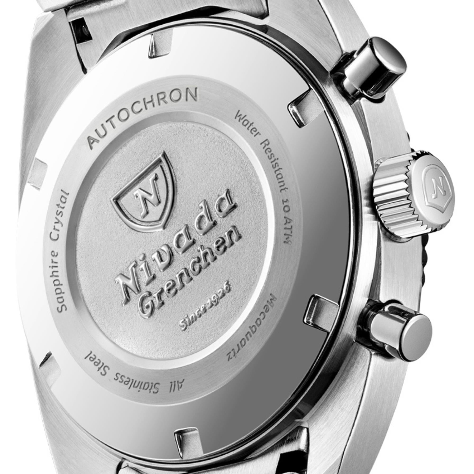 Stainless chronograph watch case back with engraved Nivada Grenchen logo