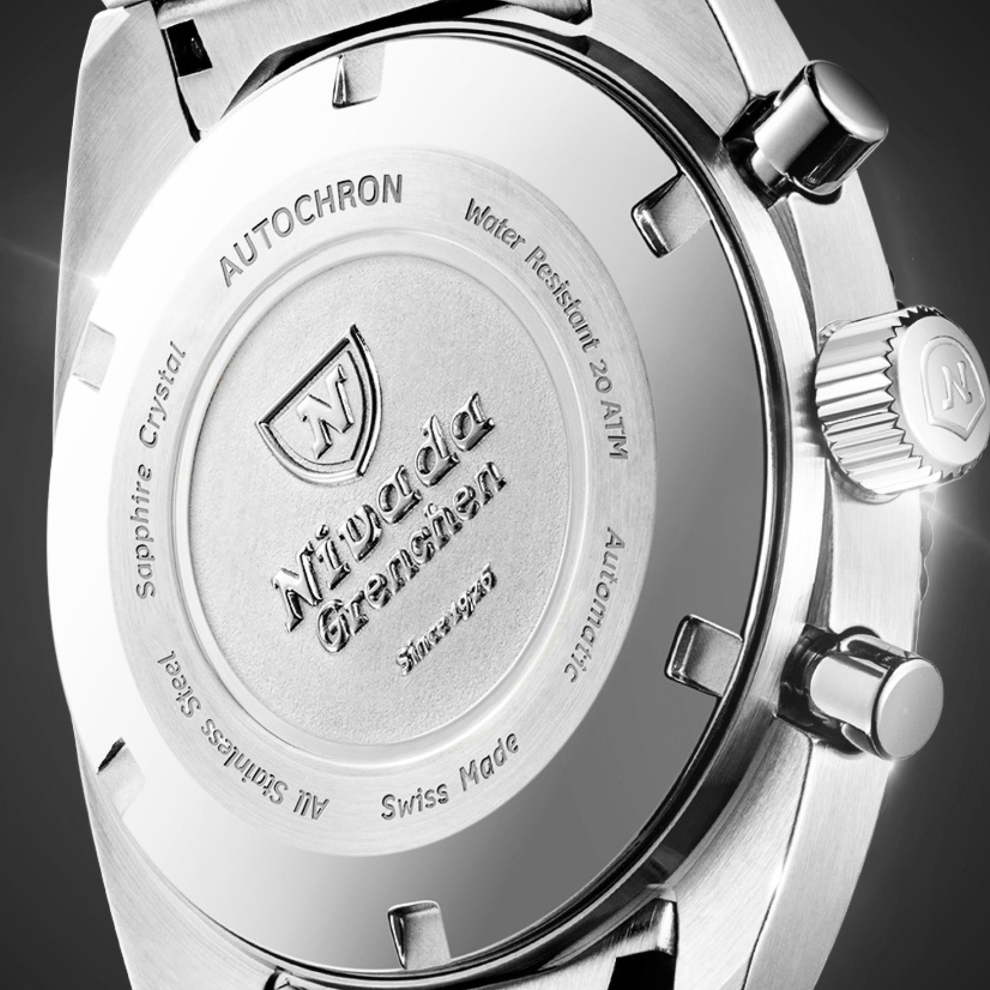 Men's quartz chronograph watch case back with engraved branding and crown